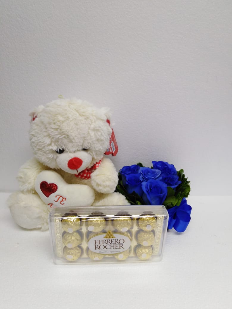 6 Rosas Azules en Caja Corazn, Bombones Ferrero Rocher 150Grs y Peluche con corazn de 30 cm 